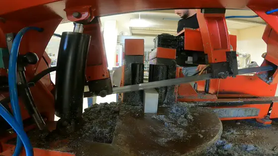 The blade works through a length of stock