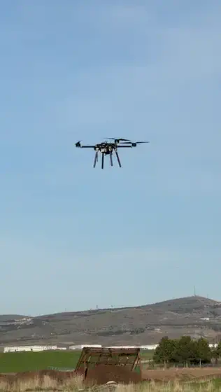 Overhead, rotors turning